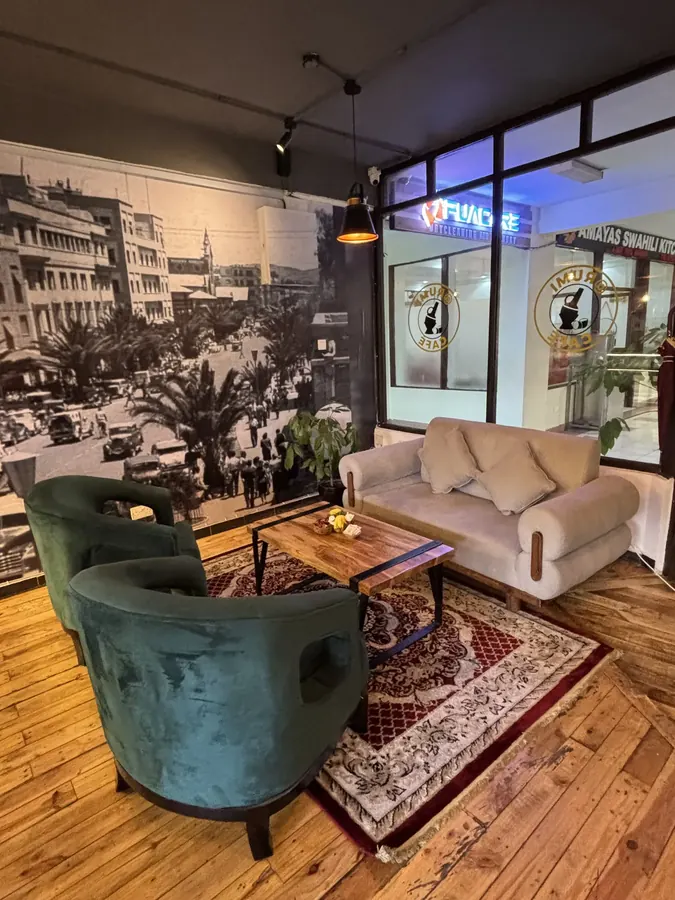 Rumi Café vintage lounge with African city mural