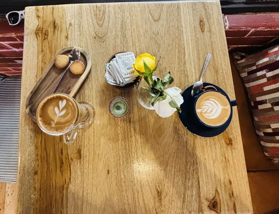 Two coffees on a table at Rumi Café