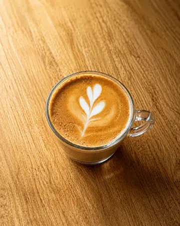 Rumi Café glass latte with cookies